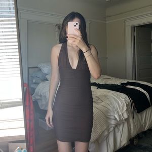 Tiger mist Carmen’s brown strappy dress